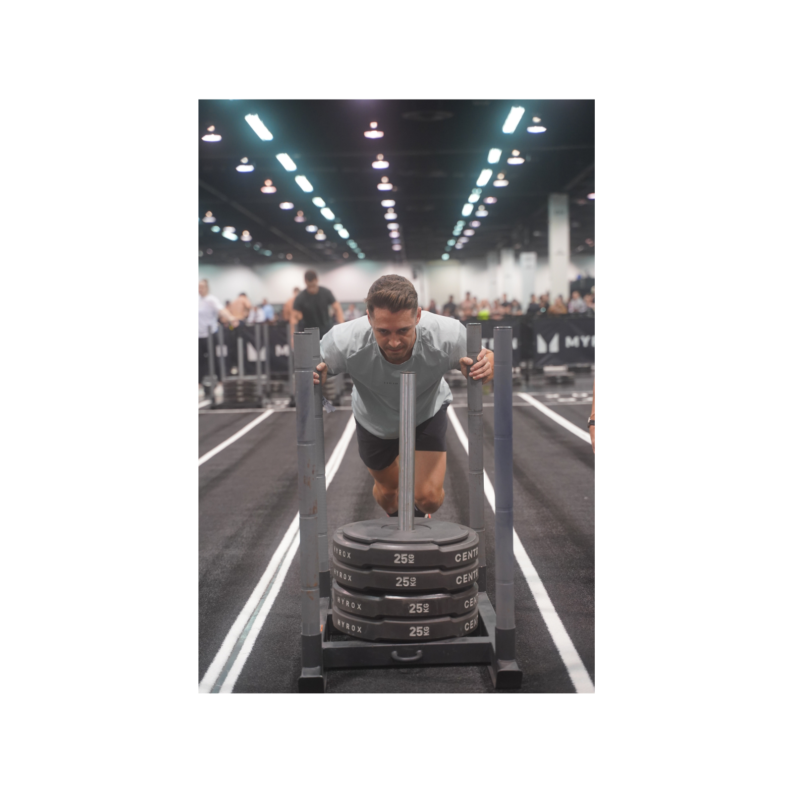 Athlete pushing a sled during competition